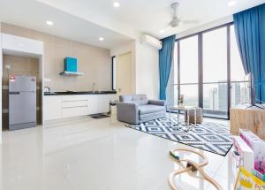 Posezení v ubytování Legoland Fun- Hostahome Suites at D'Pristine Residence