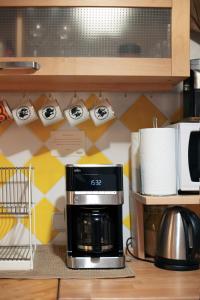 Kuchyň nebo kuchyňský kout v ubytování Victoria Design Stays - Apartment Rehorova