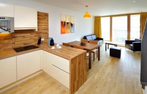 Kuchyň nebo kuchyňský kout v ubytování Emma Apartments-
