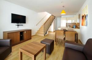 Kuchyň nebo kuchyňský kout v ubytování Emma Apartments-