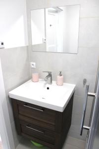 Kúpeľňa v ubytovaní Apartamenty pod Wilczakiem