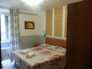 Postel nebo postele na pokoji v ubytování Roxena house