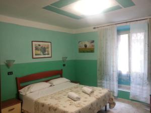 Postel nebo postele na pokoji v ubytování Roxena house