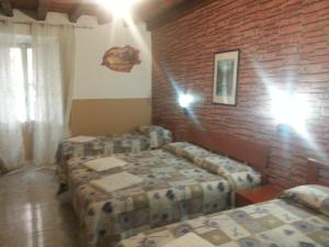 Postel nebo postele na pokoji v ubytování Roxena house