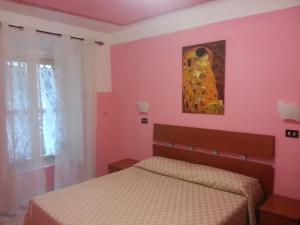 Postel nebo postele na pokoji v ubytování Roxena house