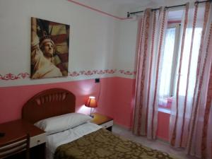 Postel nebo postele na pokoji v ubytování Roxena house