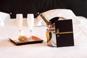 Résidence Hôtelière Natureva & Spa客房内的一张或多张床位