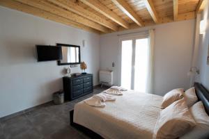 A bed or beds in a room at Villa de la Mer