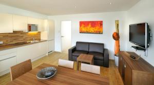 Kuchyň nebo kuchyňský kout v ubytování Emma Apartments-