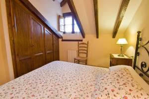 Łóżko lub łóżka w pokoju w obiekcie Vivienda Casa Luisa