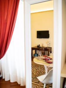 Televízia a/alebo spoločenská miestnosť v ubytovaní Turenum Apartment B&B