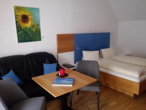 Postel nebo postele na pokoji v ubytování Hotel Eisenhuthaus