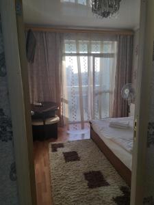 Cama o camas de una habitación en Apartment on Gorkovo 87