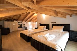 A bed or beds in a room at Villa de la Mer