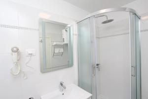 Kúpeľňa v ubytovaní Apartment Sorriso 2 + 16 fotografií