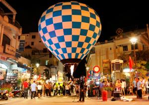 a hot air balloon in the middle of a street at Golden Star Hotel in Hue
