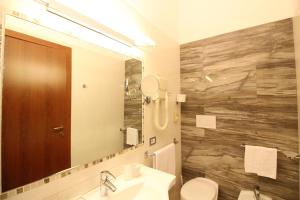 Koupelna v ubytování Hotel al Corso