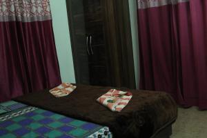 Letto o letti in una camera di Shree Ramkrishna Anandvan