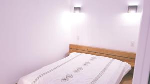 Postel nebo postele na pokoji v ubytování Res. Baie 18