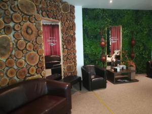 Posezení v ubytování Hotel Nevis Wellness & SPA
