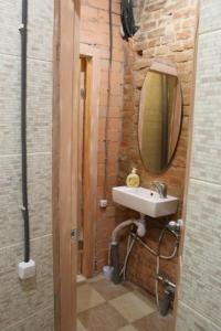 Et badeværelse på Hostel v Dnepropetrovske Grunge