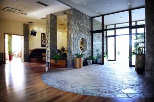 TV a/nebo společenská místnost v ubytování Hotel Aria