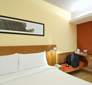 ibis Navi Mumbai - An Accor Brand客房内的一张或多张床位