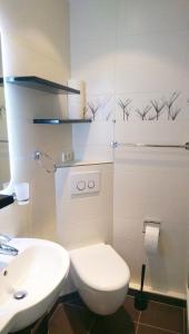 Koupelna v ubytování Wolke 5 - Urlaub in der Parkwohnanlage Atlantic