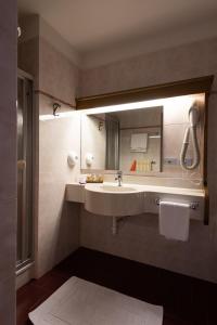 Koupelna v ubytování Hotel Catinaccio