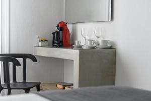 Kuchyň nebo kuchyňský kout v ubytování Cova Mykonos Suites