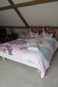 Postel nebo postele na pokoji v ubytování Le Seringat
