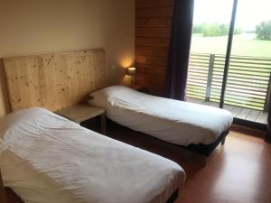 Postel nebo postele na pokoji v ubytování Hôtel Valery + 29 fotografií