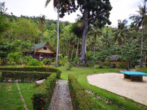 A garden outside Coconut Garden Island Resort