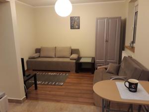 Posedenie v ubytovaní Apartament Pod Śnieżką