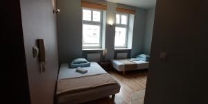 Postel nebo postele na pokoji v ubytování 999 Aparthostel