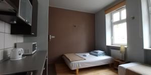 Postel nebo postele na pokoji v ubytování 999 Aparthostel