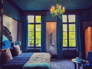 Ein Bett oder Betten in einem Zimmer der Unterkunft Maison De Plumes