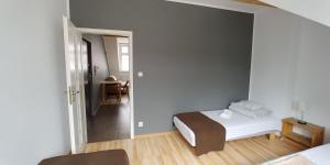 Postel nebo postele na pokoji v ubytování 999 Aparthostel