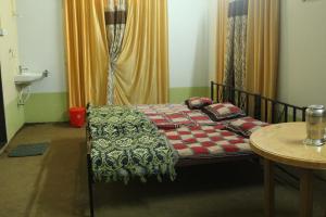 Letto o letti in una camera di Shree Ramkrishna Anandvan