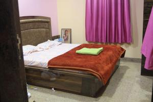 Letto o letti in una camera di Shree Ramkrishna Anandvan