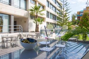 Ein Balkon oder eine Terrasse in der Unterkunft Atenea Park Suites & Apartments