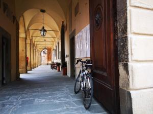 a bike parked on the side of a building at La Casina dell'Agania in Arezzo