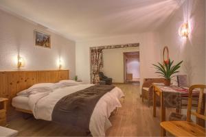 Letto o letti in una camera di Hotel Ad'Eldorado