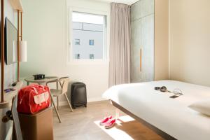 ibis budget Fribourg客房内的一张或多张床位