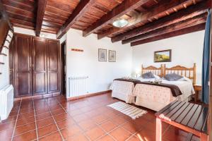A bed or beds in a room at El Pósito