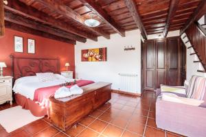 A bed or beds in a room at El Pósito Még 28 kép