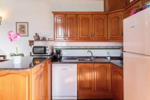A kitchen or kitchenette at El Pósito