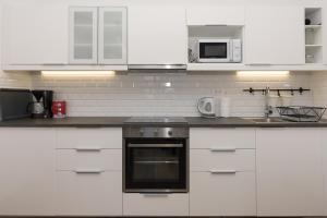 Kuchyň nebo kuchyňský kout v ubytování Apartments Ivan Zaton
