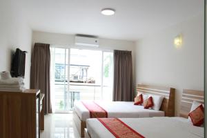 Postel nebo postele na pokoji v ubytování Ngoc Minh Hotel