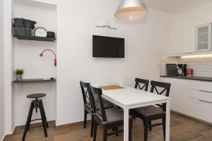 Kuchyň nebo kuchyňský kout v ubytování Apartments Ivan Zaton